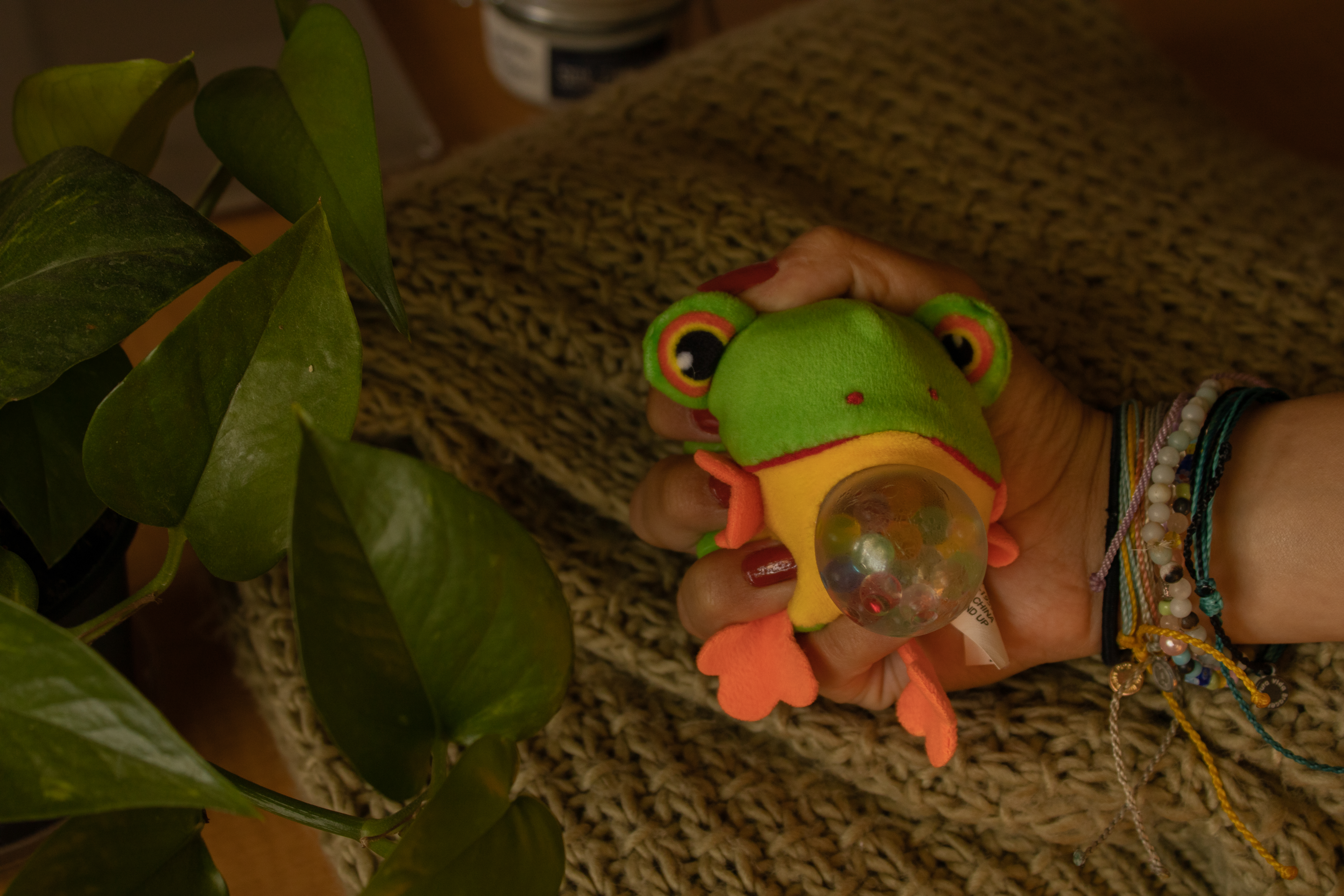 frog toy being squished.
